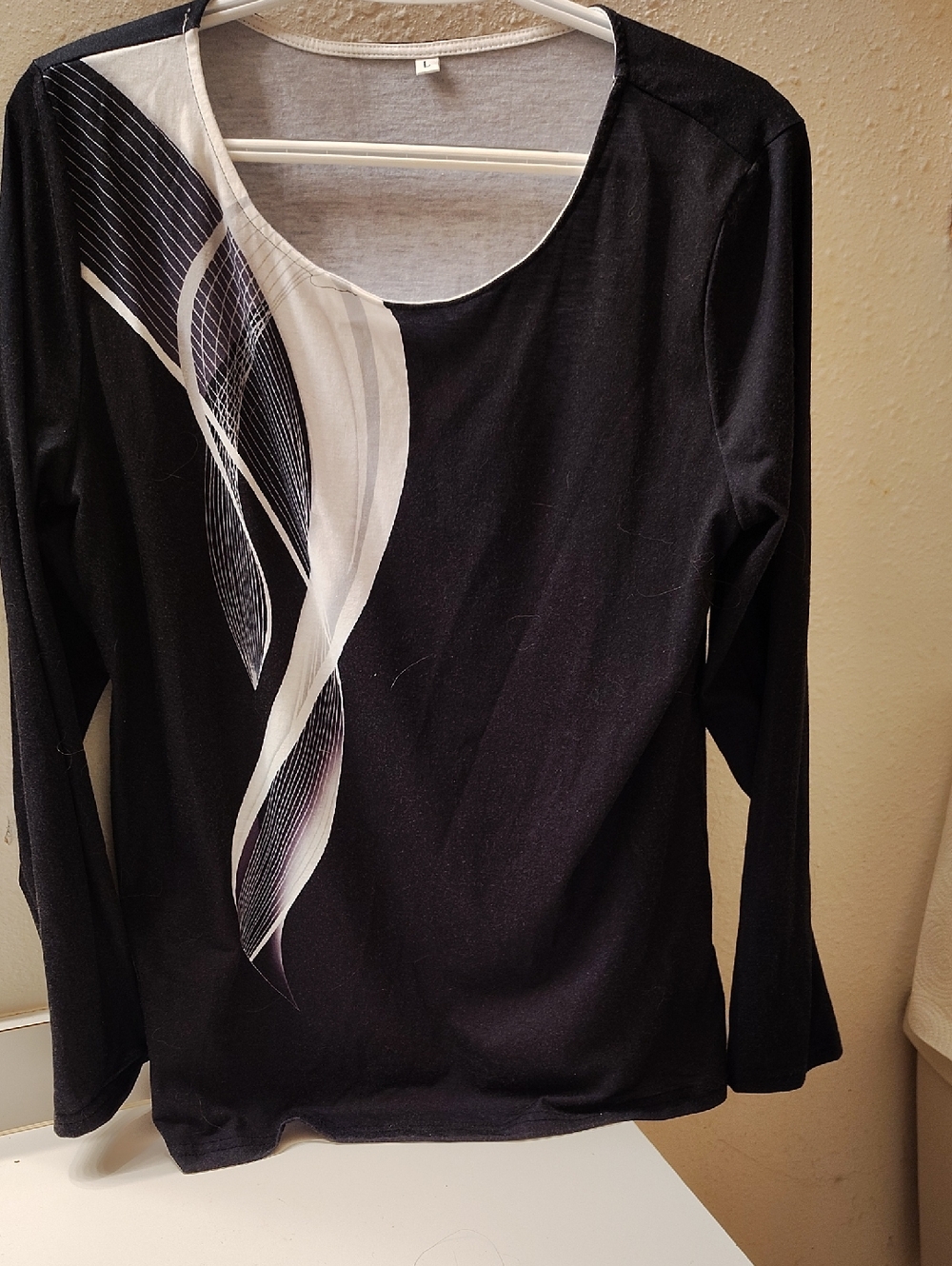 Long-Sleeve Black Womens Top with Abstract White Graphic